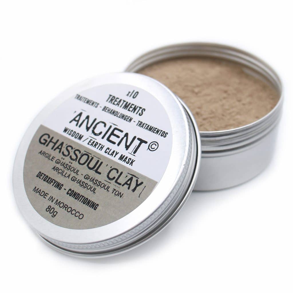 Picture of an open tin of the Ghassoul cosmetic Clay