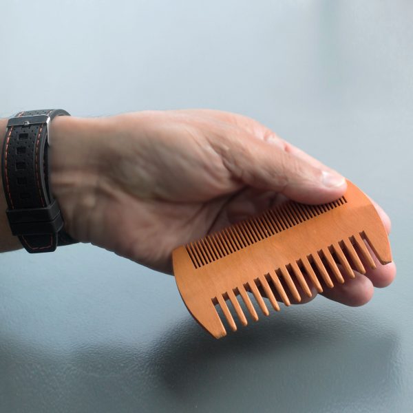 Pearwood Beard Comb in the hand