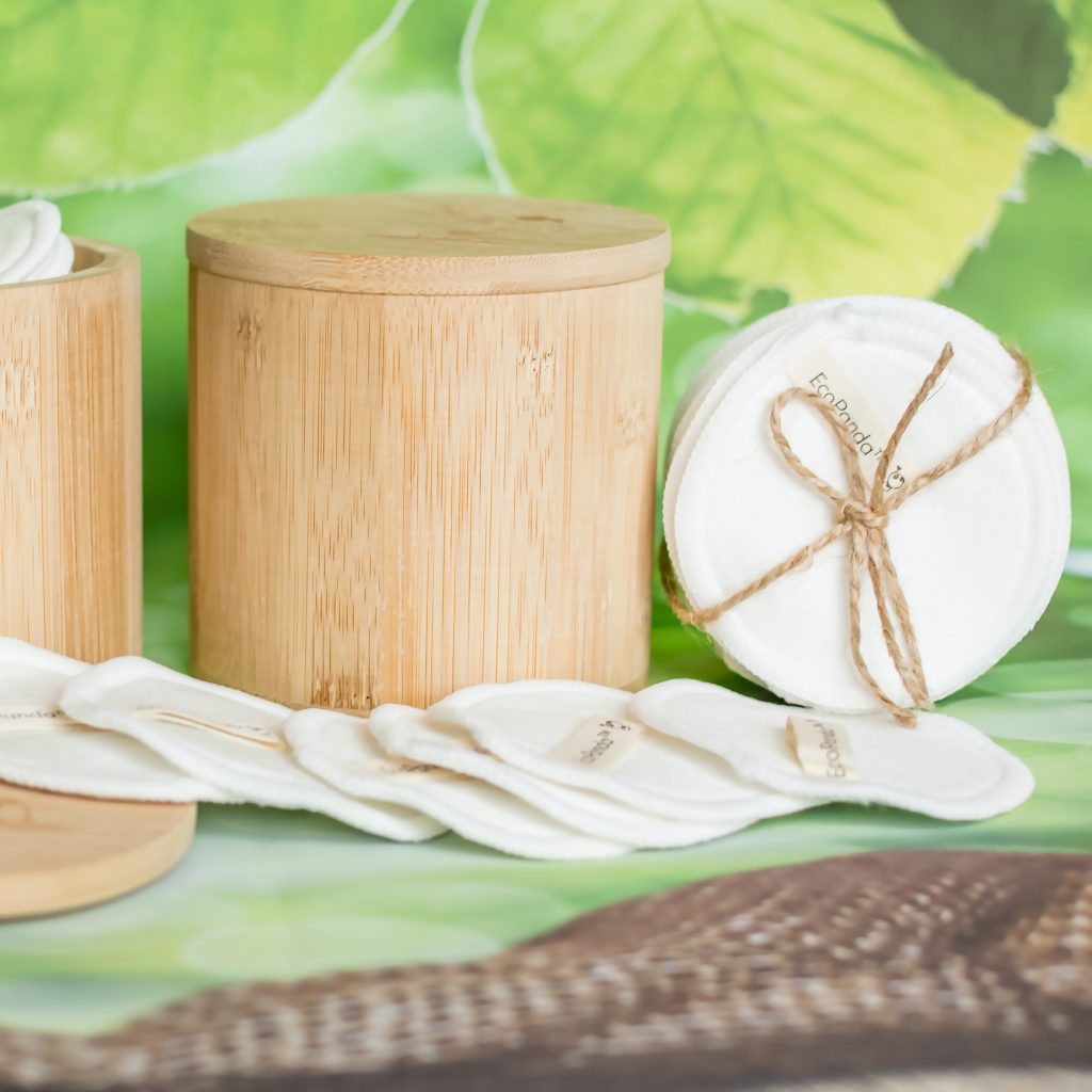 Picture of a bamboo box which can hold reusable makeup remover pads.